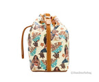 Dooney & Bourke Disney Medium Moana Coated Cotton Bucket Crossbody Bag Purse